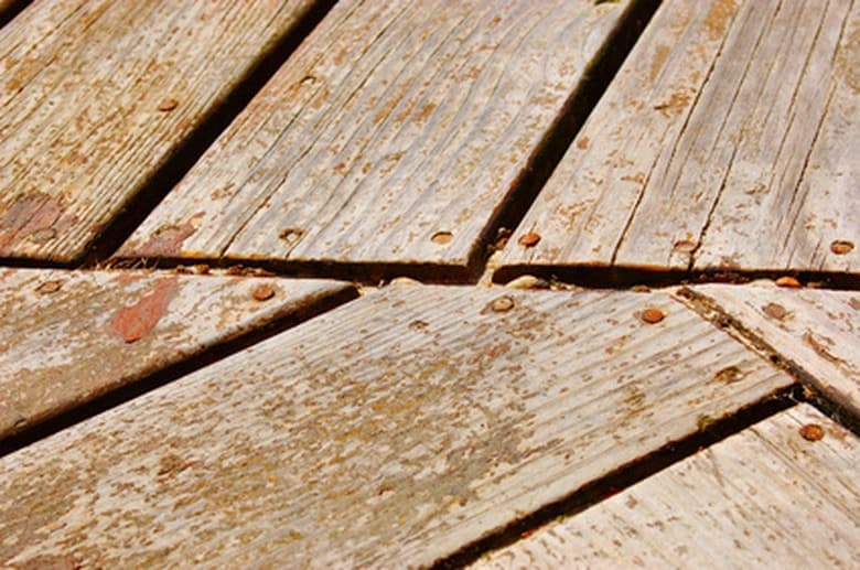Cracked, weathered deck boards