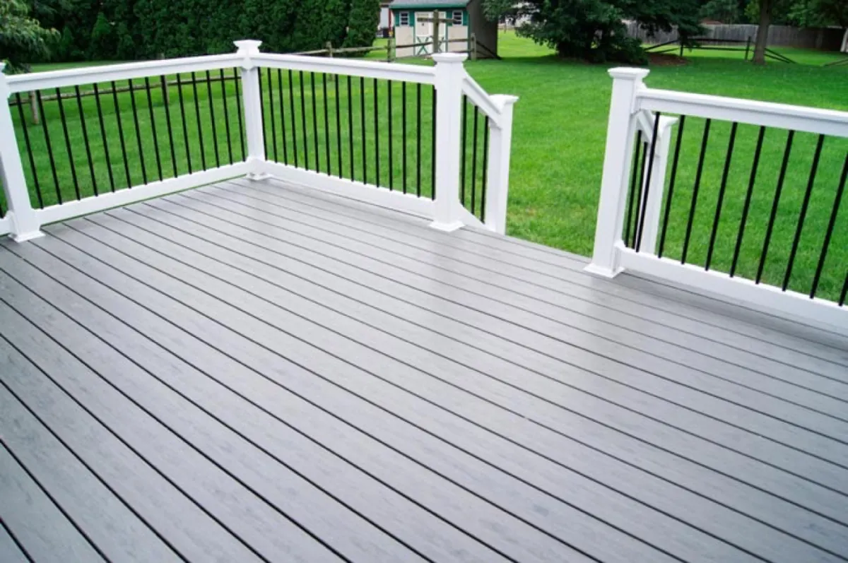 Gray composite deck with white railings