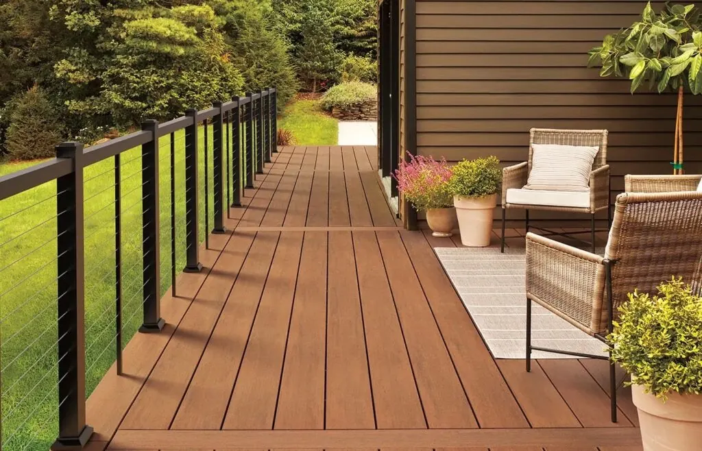 TimberTech composite deck with cable railing and patio furniture