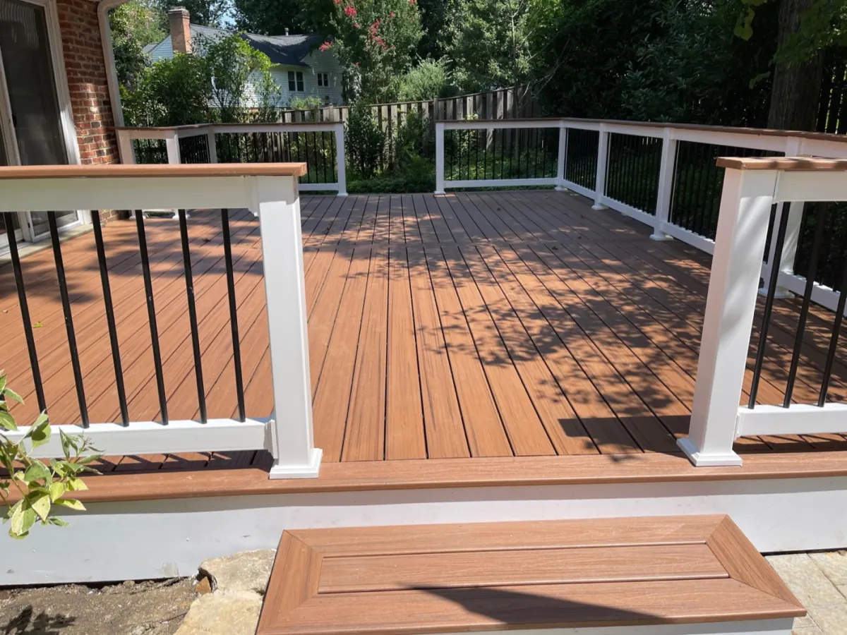 Finished Trex composite deck with white railings