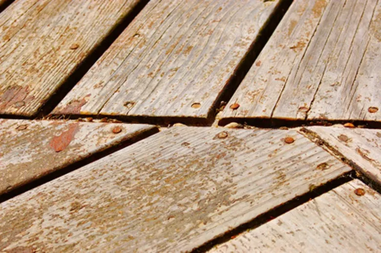 Cracked, weathered deck boards
