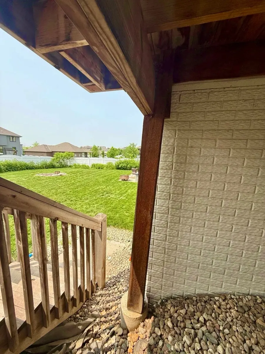Wood post supporting a raised deck