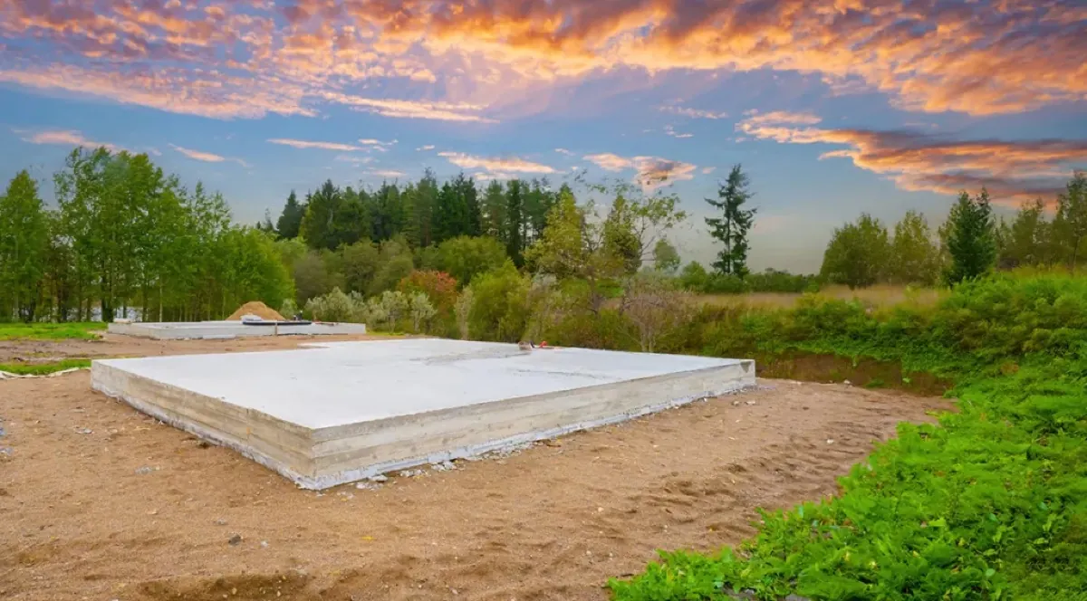 Prepared concrete pad on a graded, cleared site