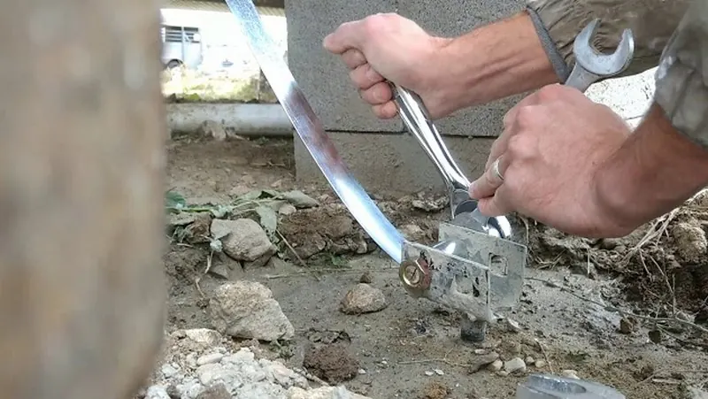 Installing a tie-down anchor strap for a mobile home